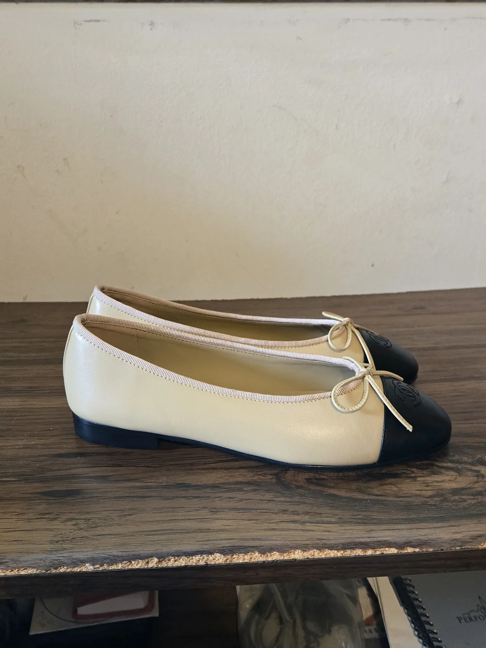 Chanel Two-Tone Leather Cap-Toe Ballet Flats in Beige & Black